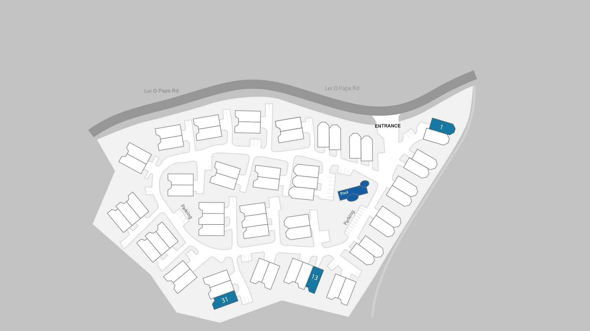 Un plan d’un quartier résidentiel, avec des îlots de maisons numérotés, une entrée et une piscine.