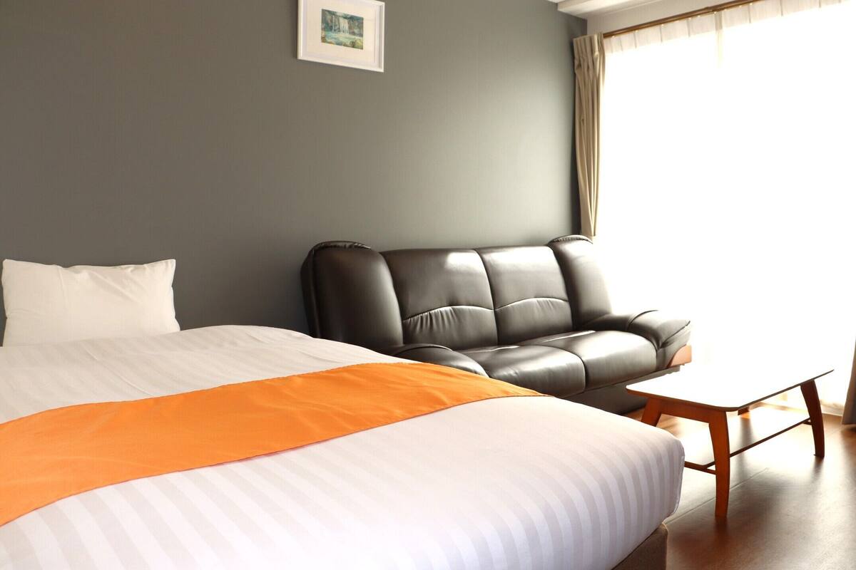 Down comforters, desk, blackout drapes, soundproofing