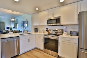 Fridge, microwave, dishwasher, coffee/tea maker
