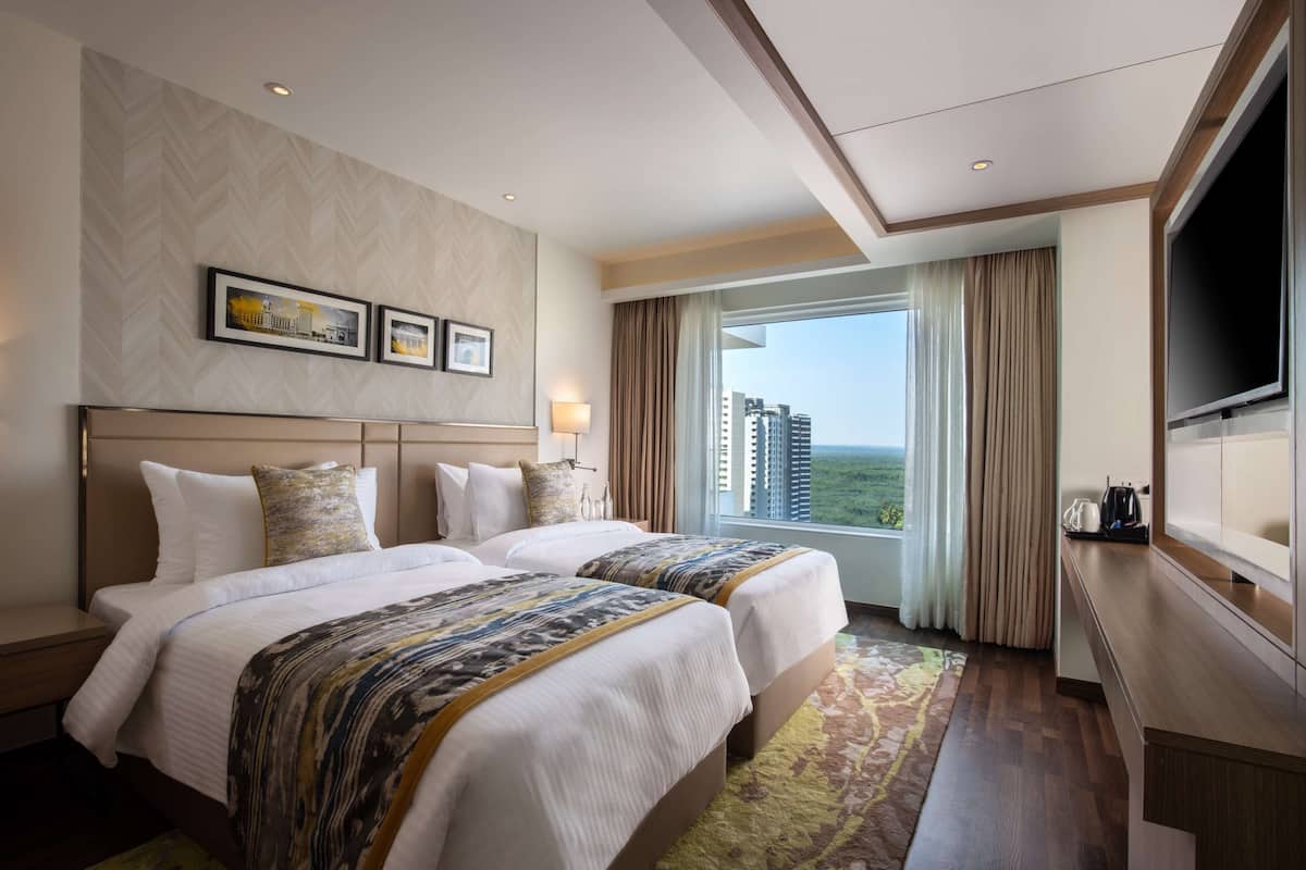 Premium bedding, down duvets, pillow-top beds, minibar