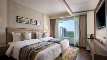 Premium bedding, down duvets, pillow-top beds, minibar