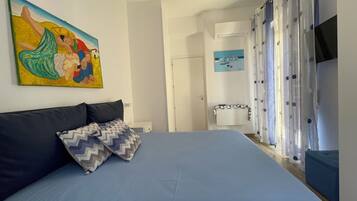 2 bedrooms, desk, iron/ironing board, travel crib