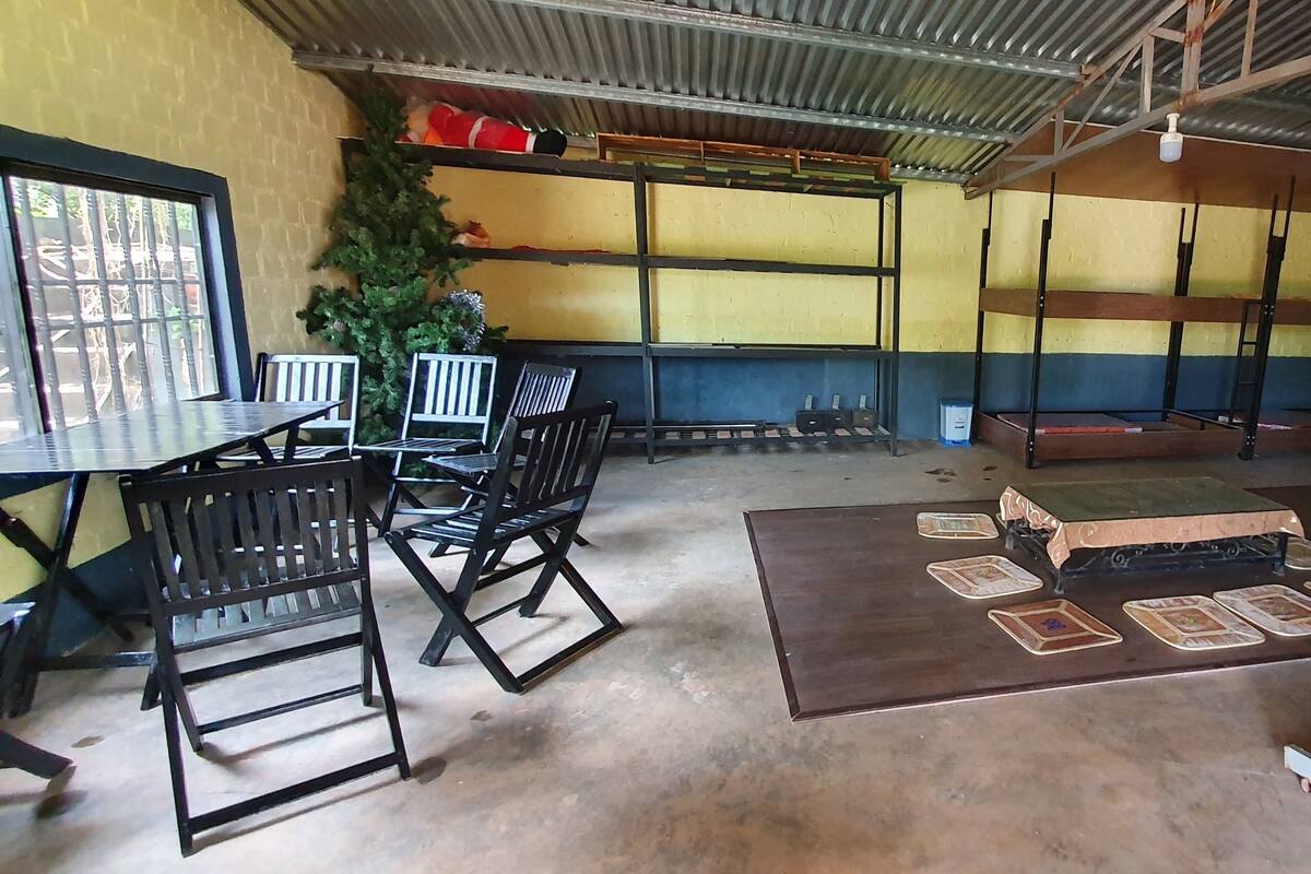 Family Room | Desk, laptop workspace, blackout curtains, iron/ironing board