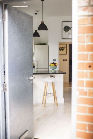 Apartment, 2 Bedrooms (The Scandi Loft) | Private kitchen | Full-sized fridge, microwave, oven, stovetop