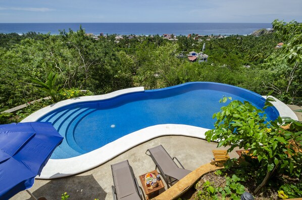 Outdoor pool, open 7:00 AM to 10:30 PM, free pool cabanas