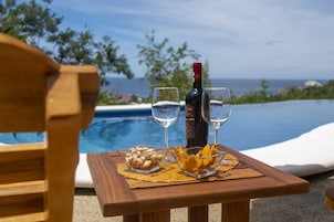 Outdoor pool, open 7:00 AM to 10:30 PM, free cabanas, pool umbrellas