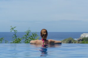 Outdoor pool, open 7:00 AM to 10:30 PM, free cabanas, pool umbrellas