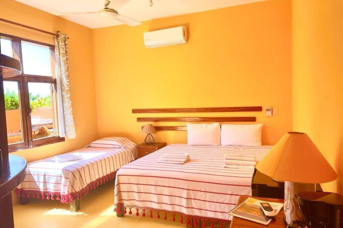 Deluxe Triple Room | Premium bedding, minibar, in-room safe, blackout curtains