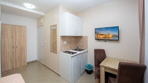 Studio, Ground Floor | Living area | 40-inch flat-screen TV with digital channels, TV - Sofija Apartments (Budva)