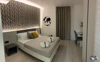 Premium bedding, down duvets, memory-foam beds, minibar