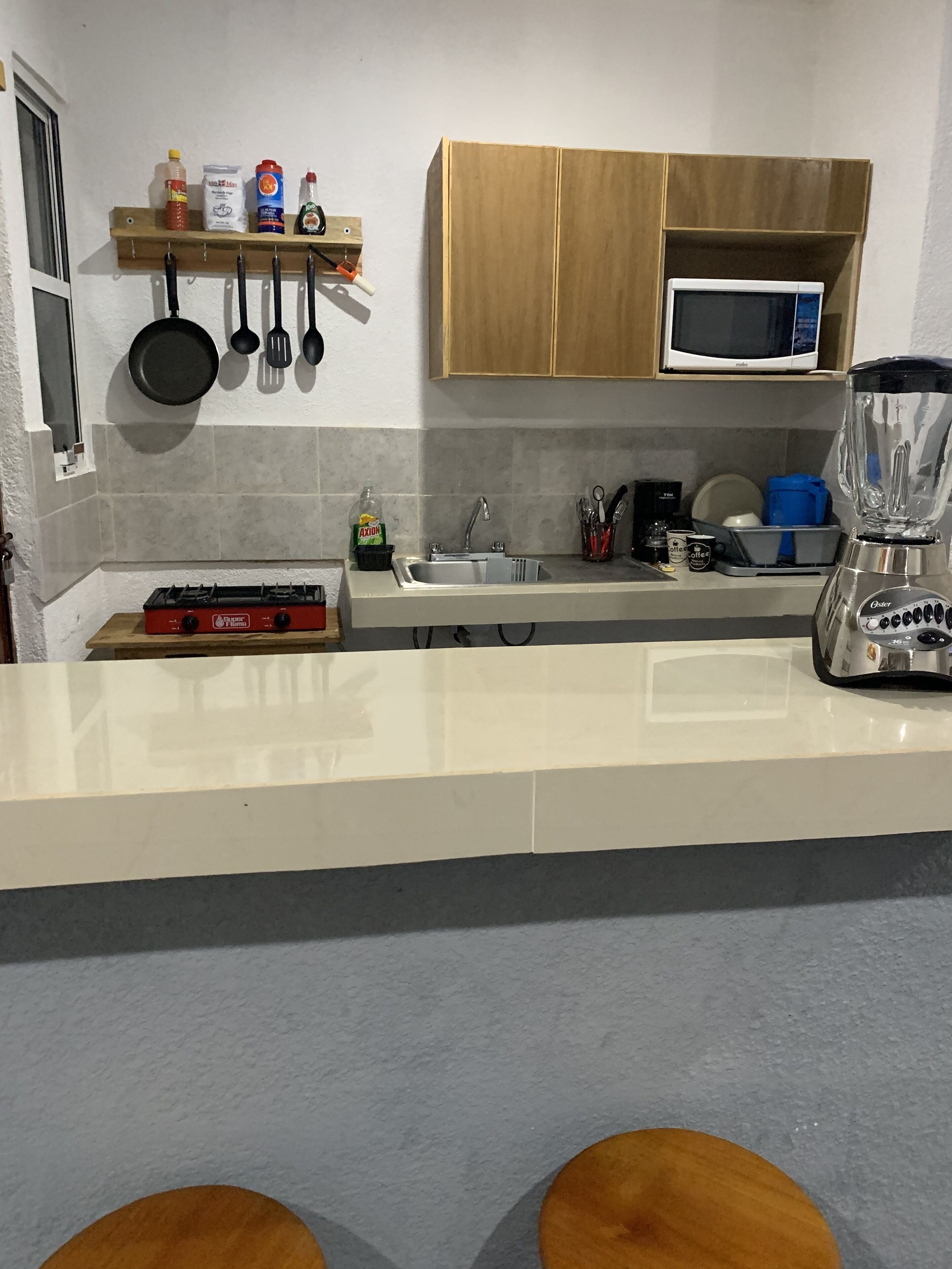 Full-sized fridge, dishwasher, cookware/dishes/utensils