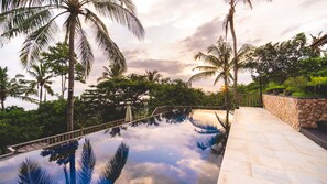 Outdoor pool, pool umbrellas, sun loungers