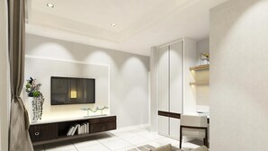 Habitación individual Deluxe | Área de sala de estar