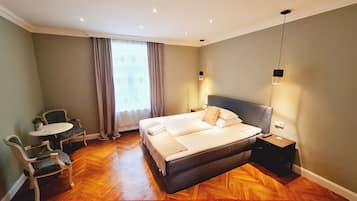 Deluxe Double Room | Living area | Flat-screen TV