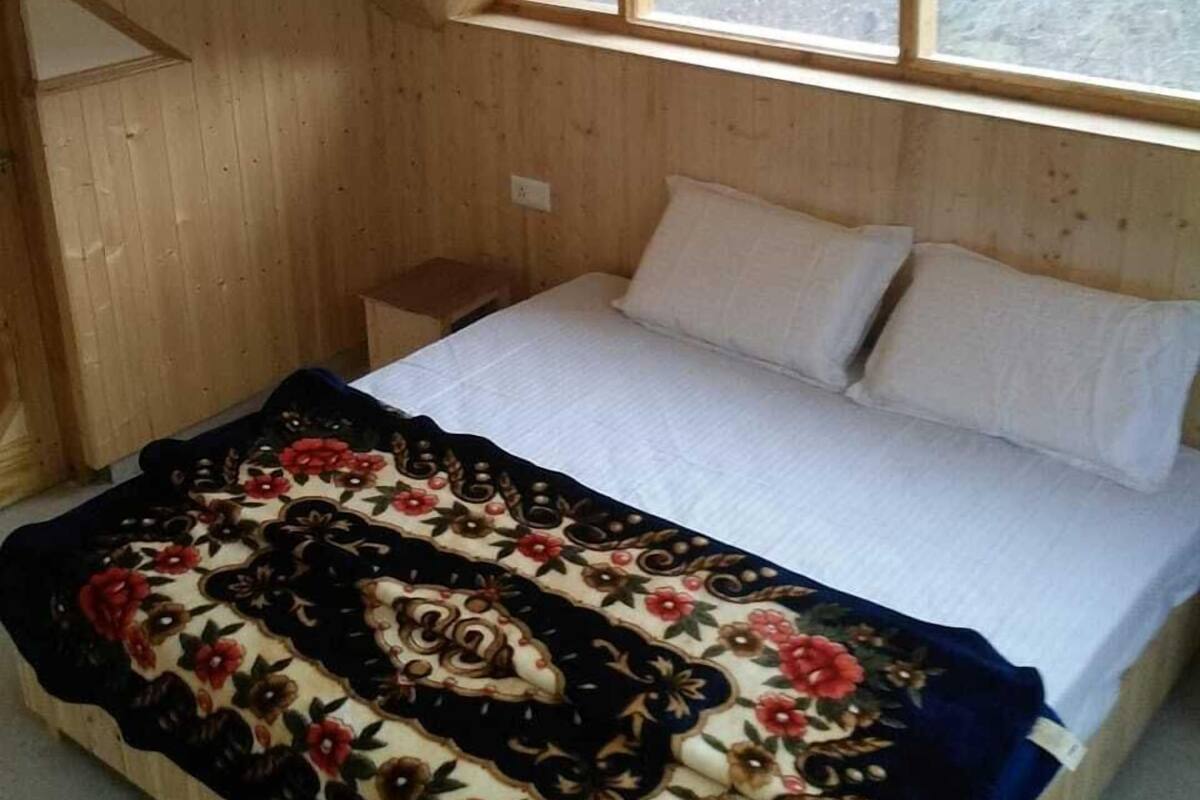 Habitación doble Deluxe | Cortinas blackout, insonorización, wifi gratis y ropa de cama
