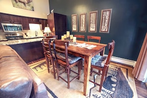 Enjoy meals in this well-appointed dining area with a table and six comfortable chairs.