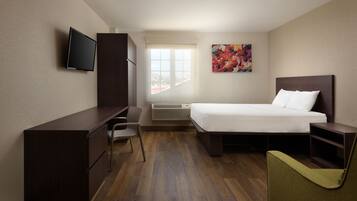 Suite, 1 Queen Bed | Desk, bed sheets