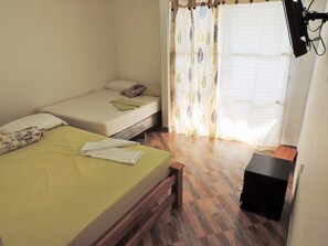 Basic Twin Room - Casa Hotel Gechalon - Su Hogar (Necoclí)