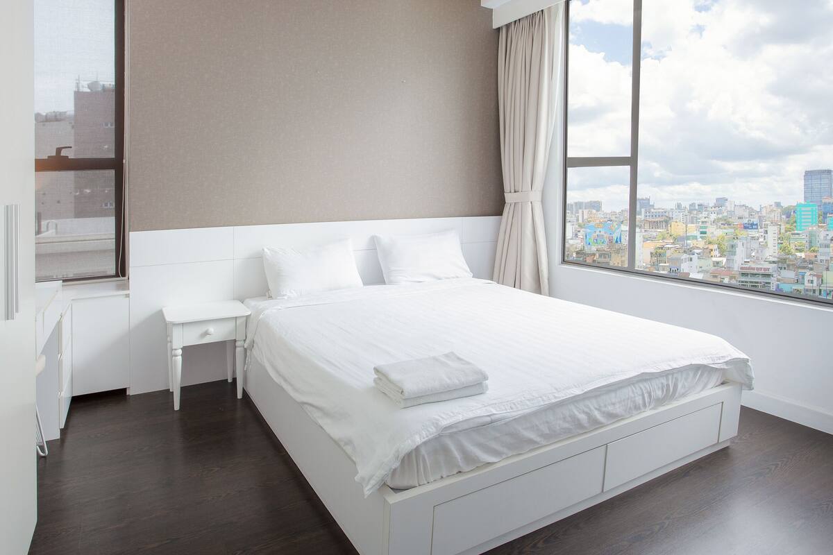 Deluxe Apartment, 2 Bedrooms | 2 bedrooms, desk, laptop workspace, iron/ironing board