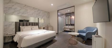 Deluxe Room, Non Smoking, City View | Free minibar, desk, laptop workspace, blackout curtains