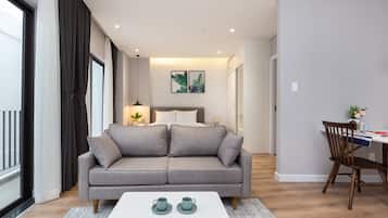 Business Studio | Living room | LCD TV, fireplace