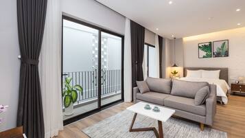 Business Studio | Living room | LCD TV, fireplace