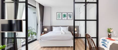 Signature studio | Woonruimte | Lcd-televisie en een open haard