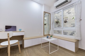 Deluxe Apartment, 4 Bedrooms, Non Smoking | Living area | LCD TV, fireplace