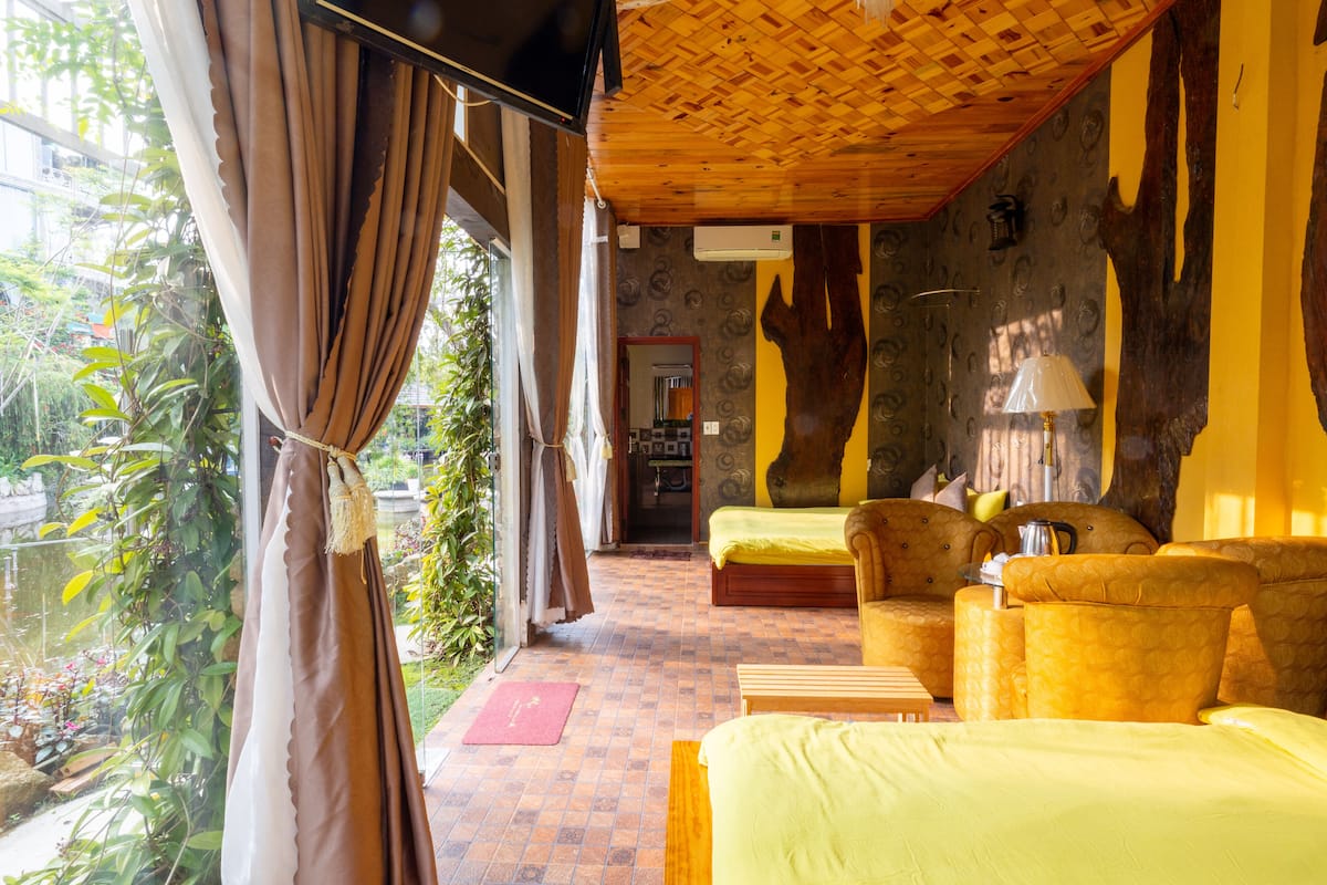 Bungalow, Lake View (3 Queen Beds) | 1 bedroom, premium bedding, minibar, individually decorated