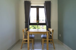 Appartement Deluxe, balcon | Équipements de la chambre