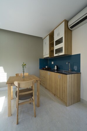 Superior Apartment, Balcony | Private kitchen | Fridge, microwave, cookware/dishes/utensils - Vin Apartment (Da Nang)