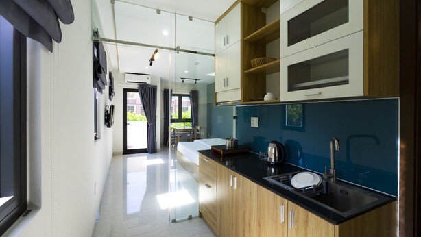 Deluxe Apartment, Balcony | Private kitchen - Vin Apartment (Da Nang)