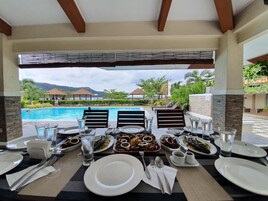 Breakfast, lunch, dinner served; local cuisine 