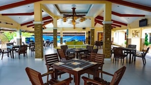 Breakfast, lunch, dinner served; local cuisine