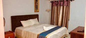 골든 홈 인 호텔 & 스위트