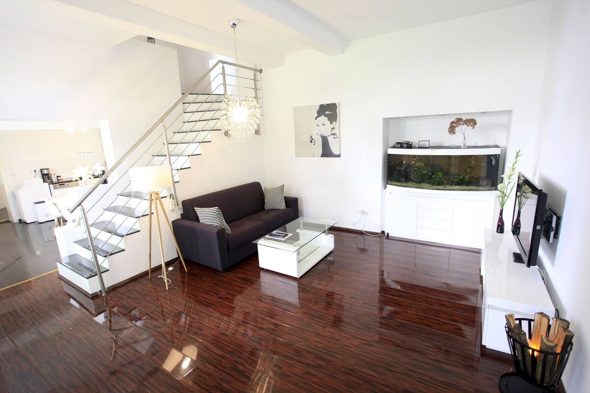 Loft, Garden Area | Living area | 44-inch Smart TV with cable channels, TV