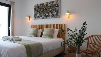 Superior Double Room | Minibar, in-room safe, individually decorated, individually furnished