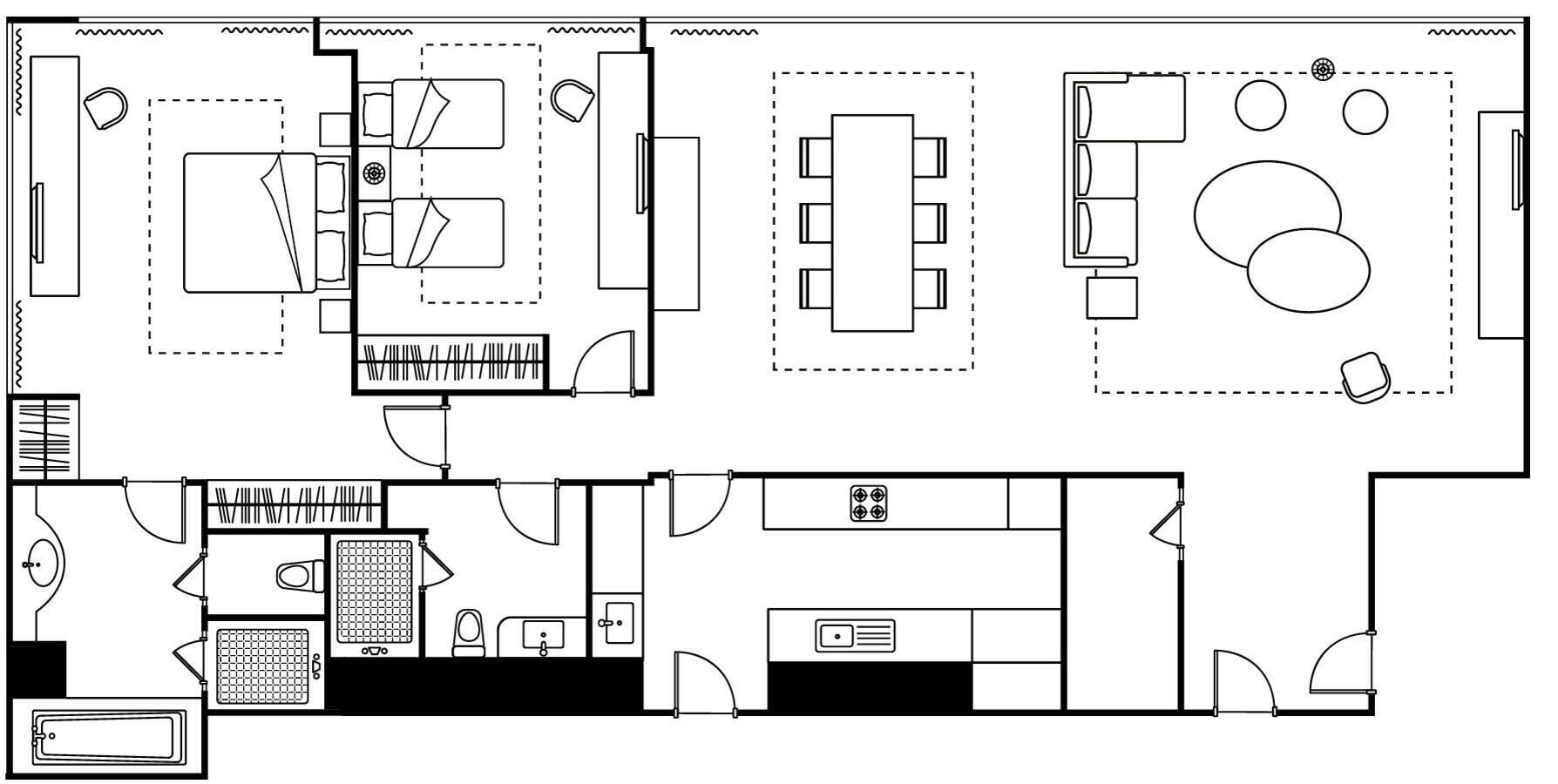 A hotel layout with multiple rooms, a kitchen area, and a dining space.