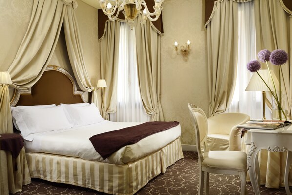 Hypo-allergenic bedding, minibar, in-room safe, desk