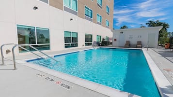 Outdoor pool, open 10:00 AM to 10:00 PM, sun loungers