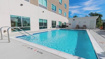 Outdoor pool, open 10:00 AM to 10:00 PM, sun loungers