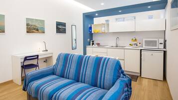 Studio Confort | Coin séjour