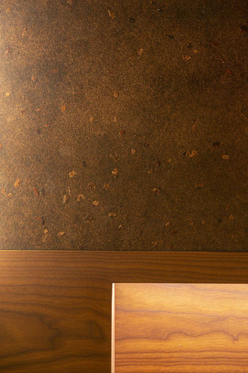 A wooden floor with a textured surface and a visible grain pattern.