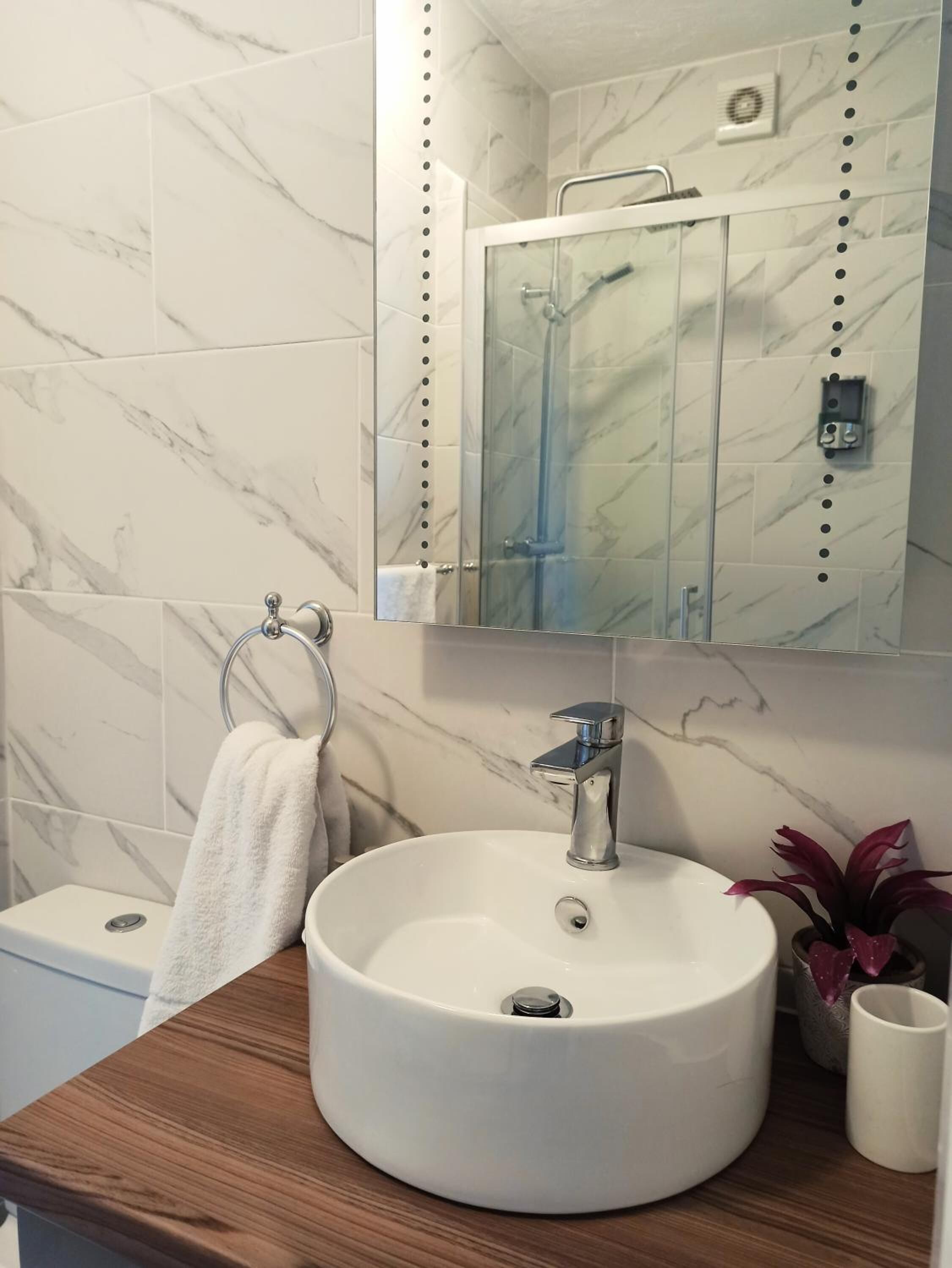 standard double room | bathroom | shower, hair dryer, towels, soap