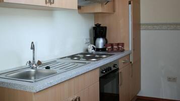 Apartment, 2 Bedrooms | Private kitchen | Full-sized fridge, oven, stovetop, electric kettle