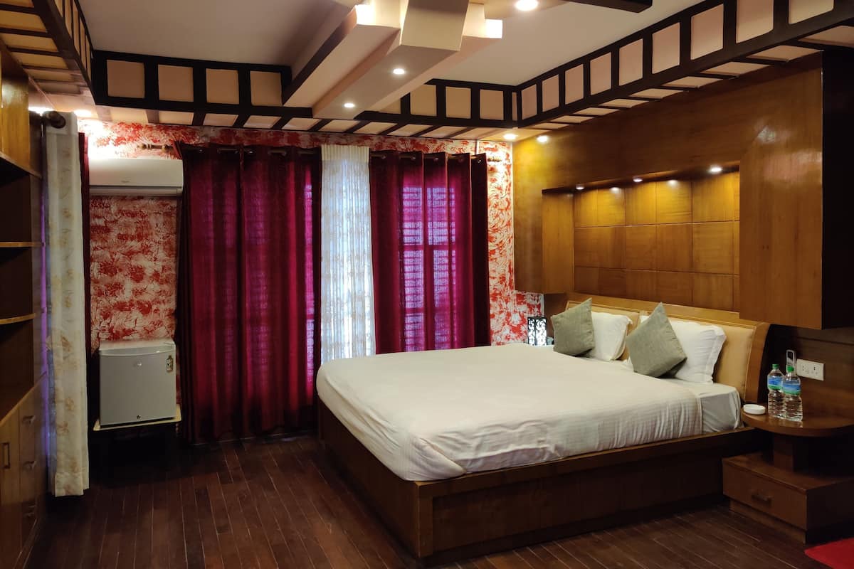 Habitación de lujo | Ropa de cama de alta calidad, camas con efecto memoria y minibar