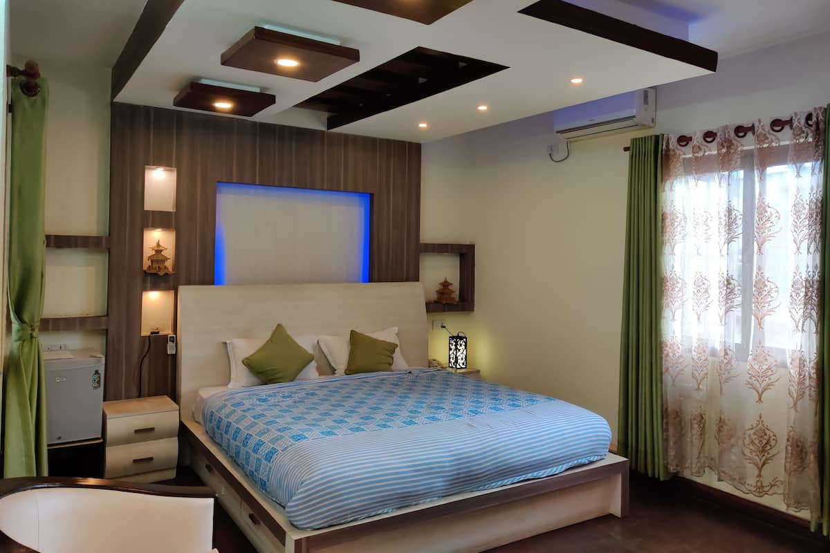 Habitación superior | Ropa de cama de alta calidad, camas con efecto memoria y minibar
