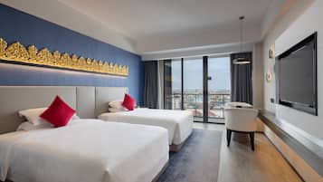 Deluxe Twin kamer | Een minibar, een kluis op de kamer, gratis wifi, beddengoed