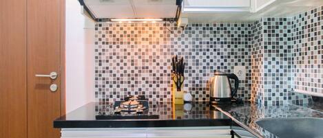 Apartment, 2 Bedrooms | Private kitchenette | Fridge, stovetop, cookware/dishes/utensils