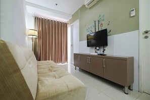 Departamento, 2 habitaciones | Área de sala de estar | Televisión 